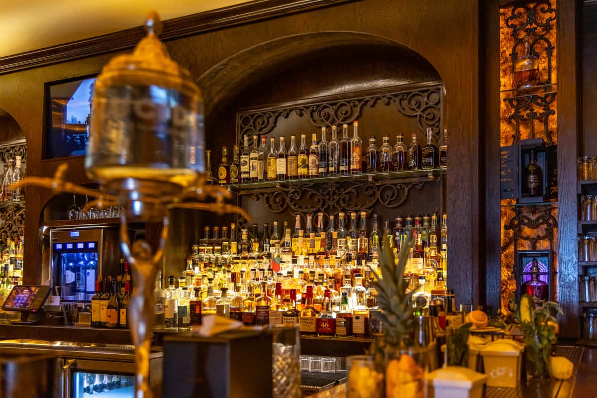 The illuminated backbar at Red Phone Booth Miami in Brickell.