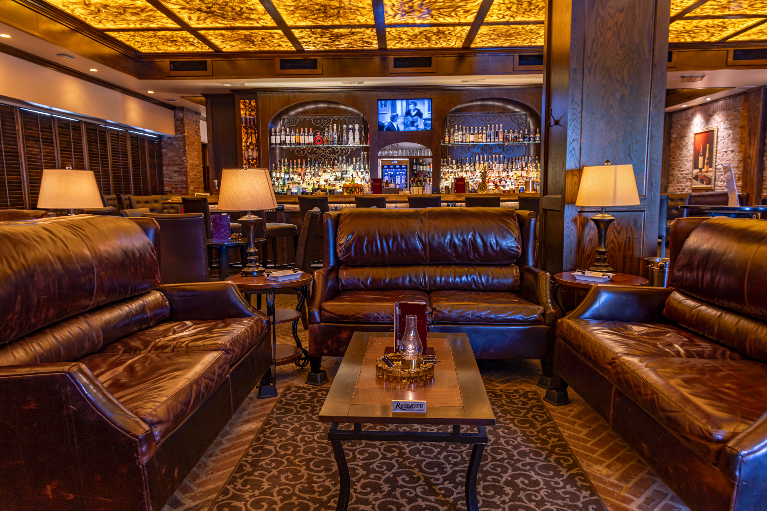 Leather lounge seating at Red Phone Booth Downtown Atlanta.