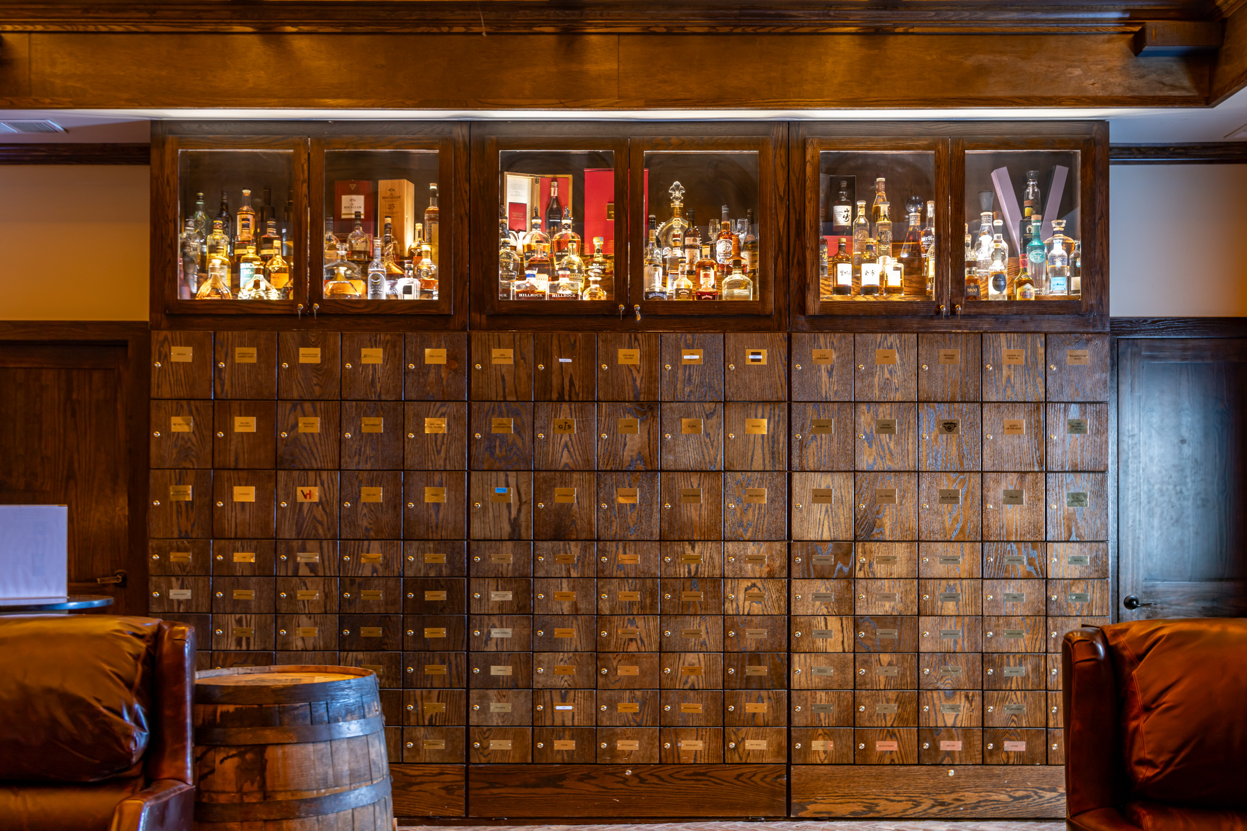 Cigar lockers and bottles at Red Phone Booth Miami.